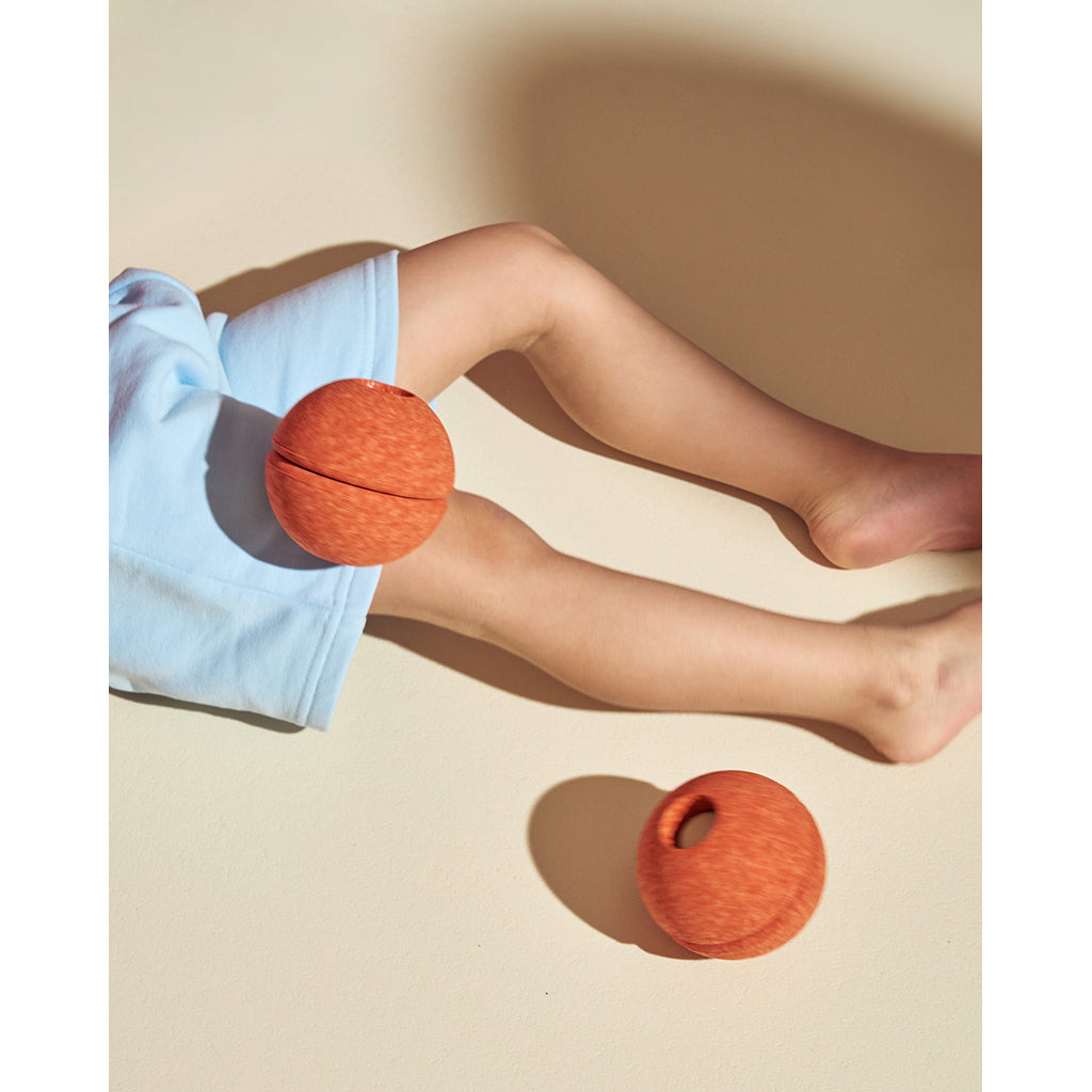 Modu skumbold, Burnt orange/ Dusty green