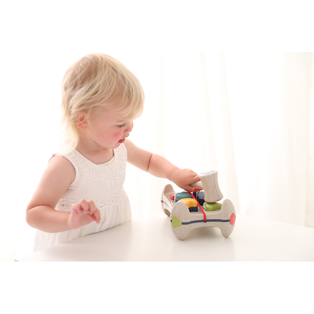 Tolo, Hammerbræt og puttekasse i ét