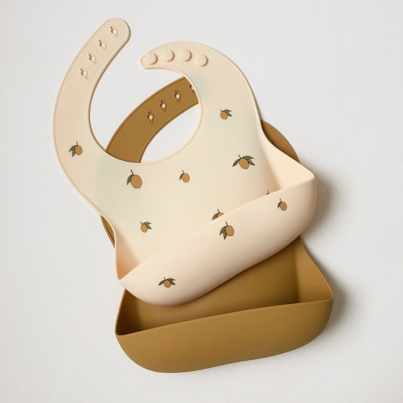 Konges Sløjd silikone hagesmæk m. lomme, 2-pak - Lemon/almond