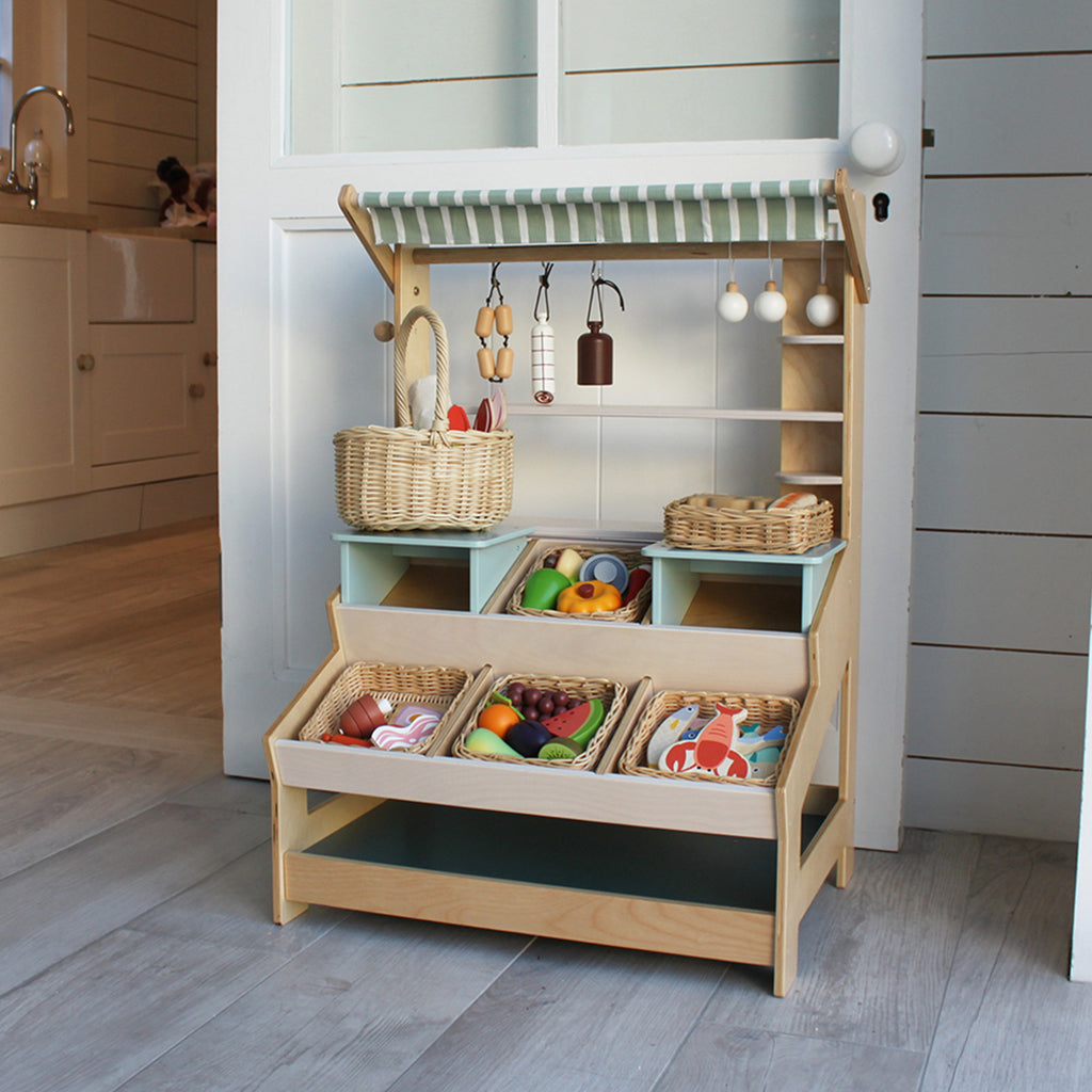 Tender Leaf, Markedsbod i træ